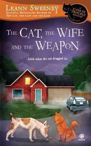 The cat, the wife, and the weapon [large print] / by Leann Sweeney.