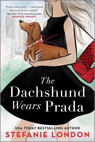 The dachshund wears Prada / Stefanie London.